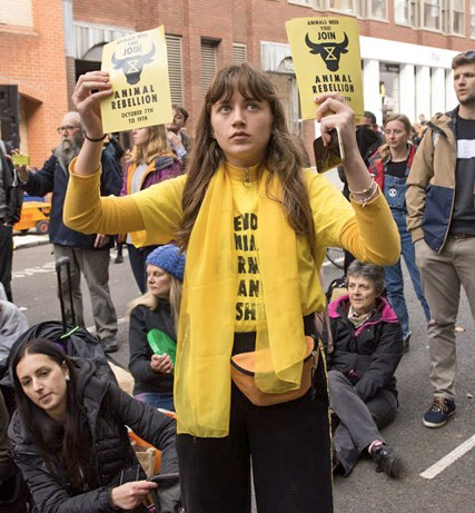 lauren marching at an animal rebellion rally