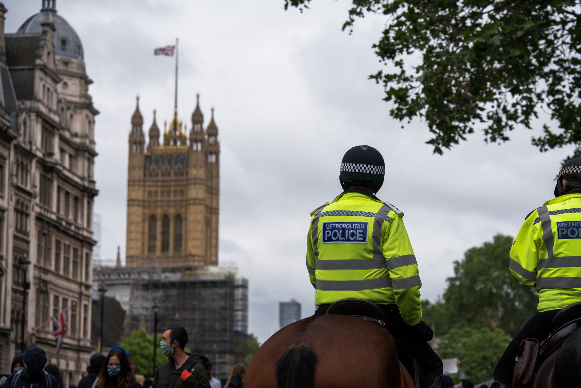 police on horseback outside the houses of parliament